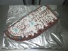 Torta di Compleanno con pan di spagna, crema, cioccolata e panna montata.
